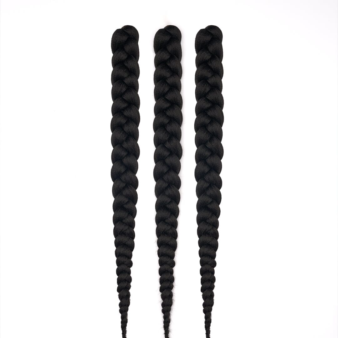 Three bundles of 28" braided hair in black, laying on a white field.