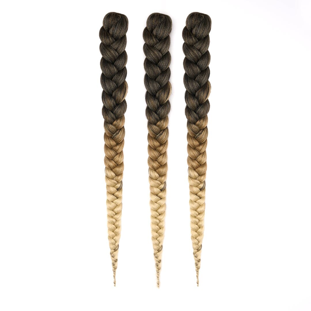 Three bundles of 28" braided hair in ombrƩ dark brown to blonde, laying on a white field.