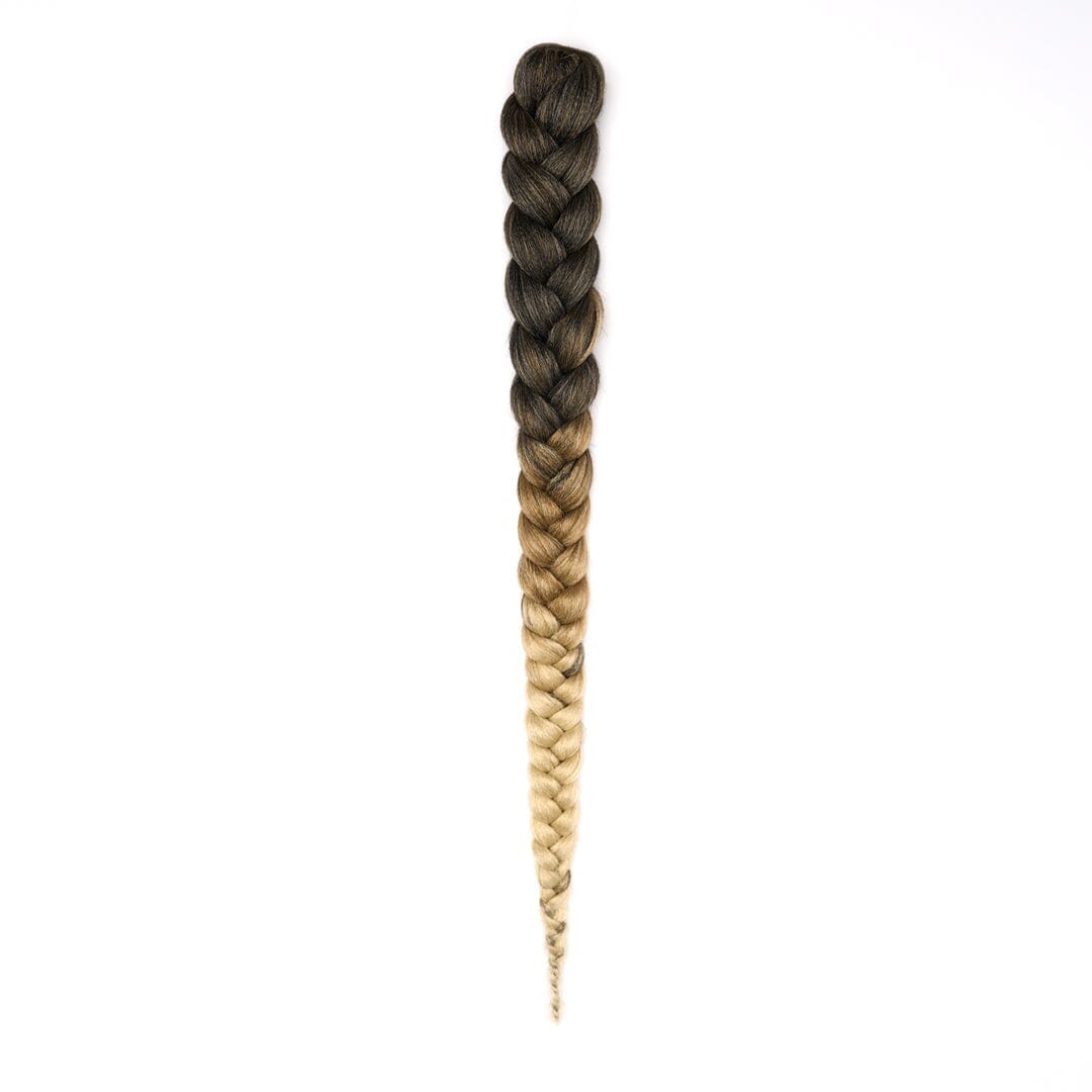 A length of braided hair in ombré brown to blonde on a white field.