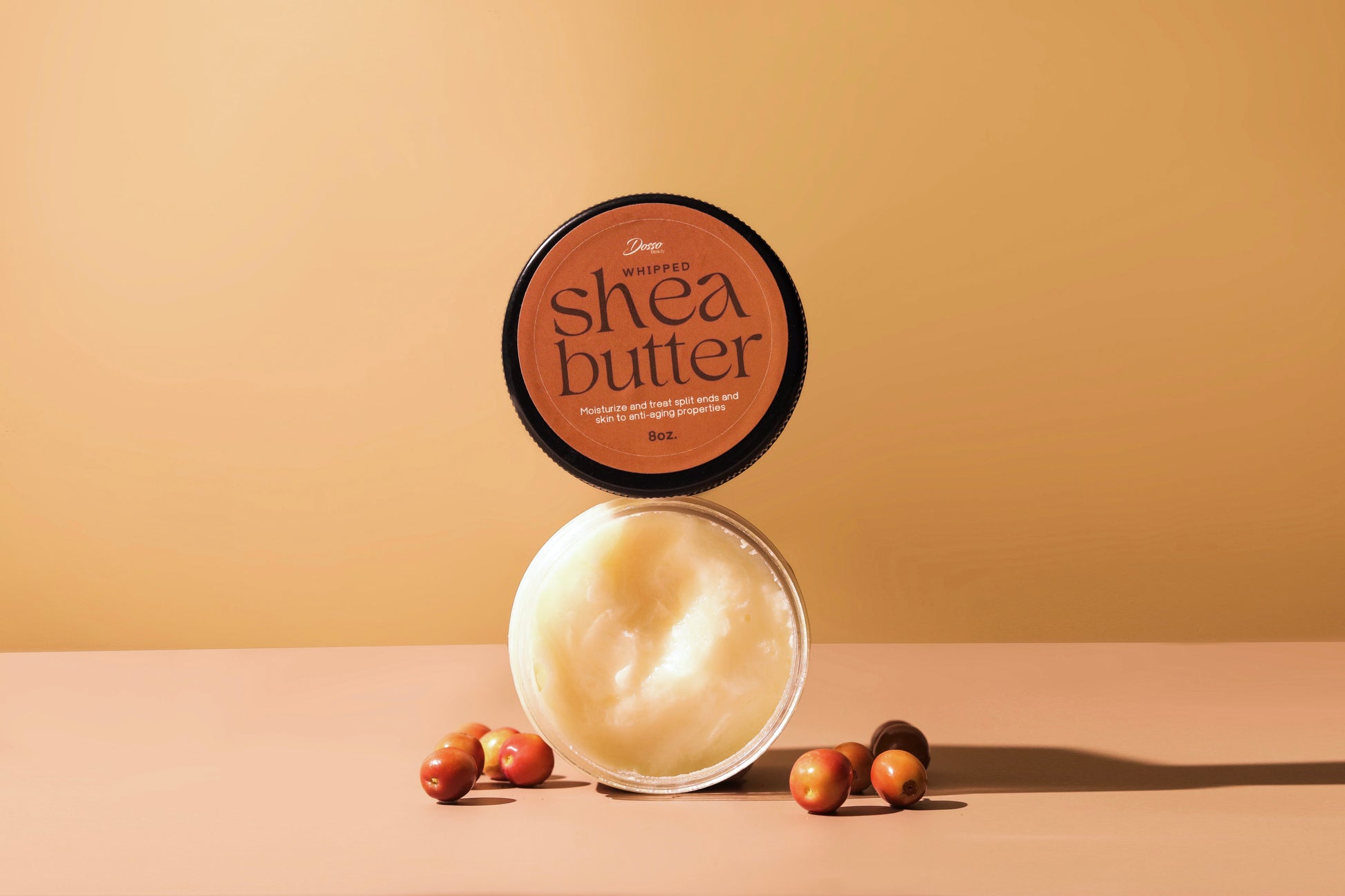 Lifestyle shot of Shea Butter with lid off