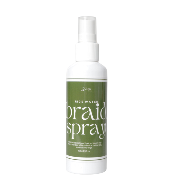 Bottle of rice water braid spray on a white background