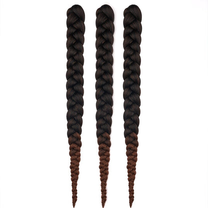 Three bundles of 28" braided hair in ombré black to dark brown, laying on a white field.