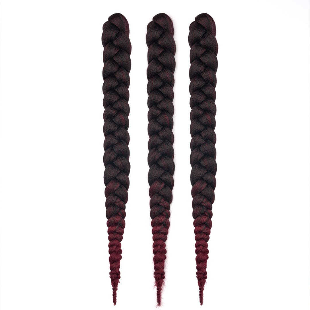 Three bundles of 28" braided hair in ombré black to burgundy, laying on a white field.
