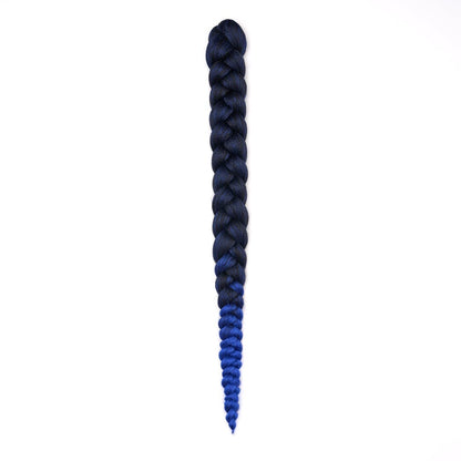 A length of braided hair in ombré navy to blue on a white field.