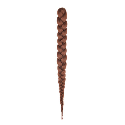 A length of braided hair in a sable color on a white field.